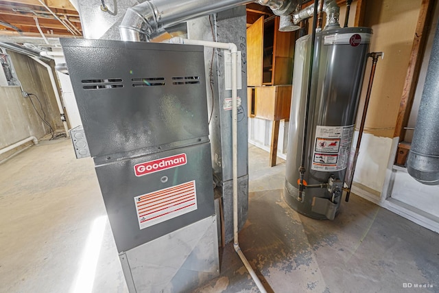 utility room featuring gas water heater and heating unit