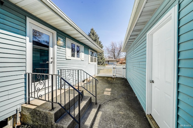 view of patio featuring fence