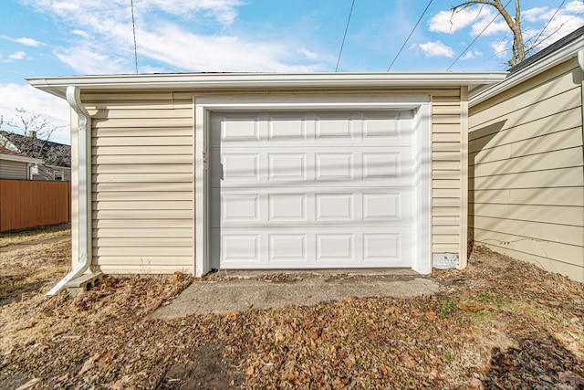 garage featuring fence