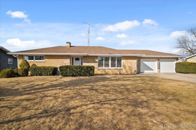 single story home with brick siding, a chimney, an attached garage, driveway, and a front lawn