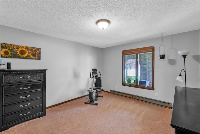 exercise area with carpet floors, baseboards, a baseboard heating unit, and a textured ceiling