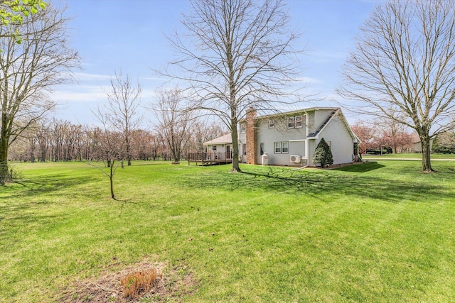 view of yard with a deck