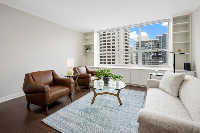 living area featuring baseboards, built in features, dark wood finished floors, crown molding, and a city view