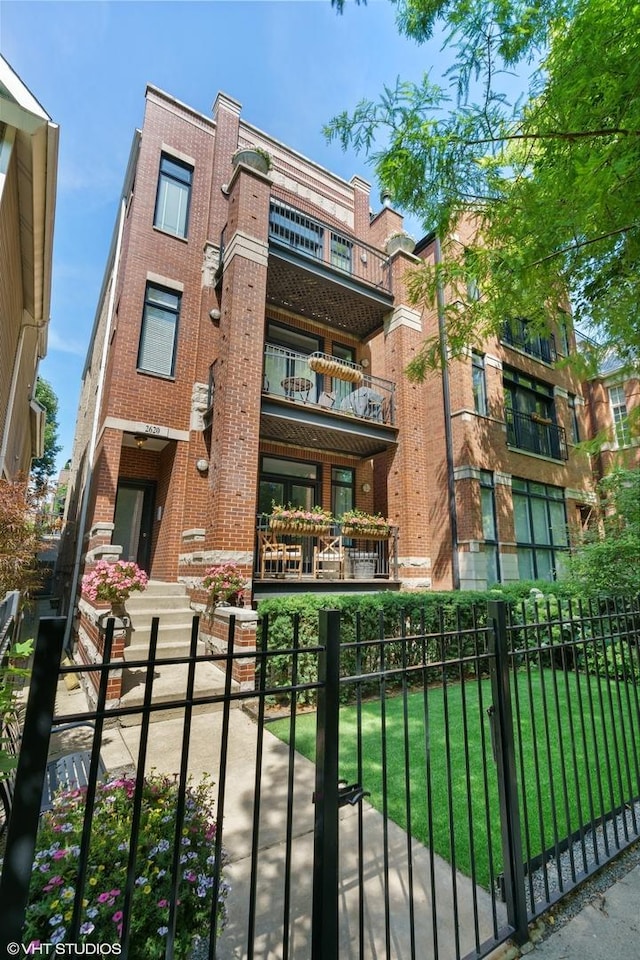 view of property featuring a fenced front yard