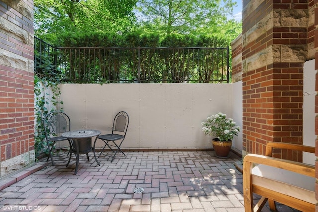 view of patio / terrace with fence