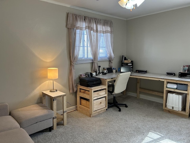 office with a ceiling fan, light colored carpet, crown molding, and baseboards