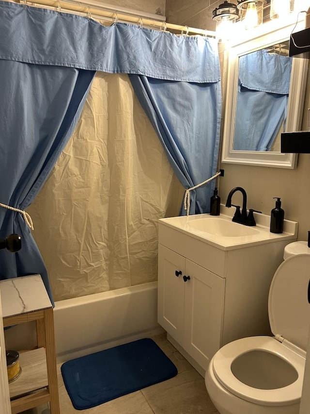 bathroom with vanity, toilet, and shower / bathtub combination with curtain