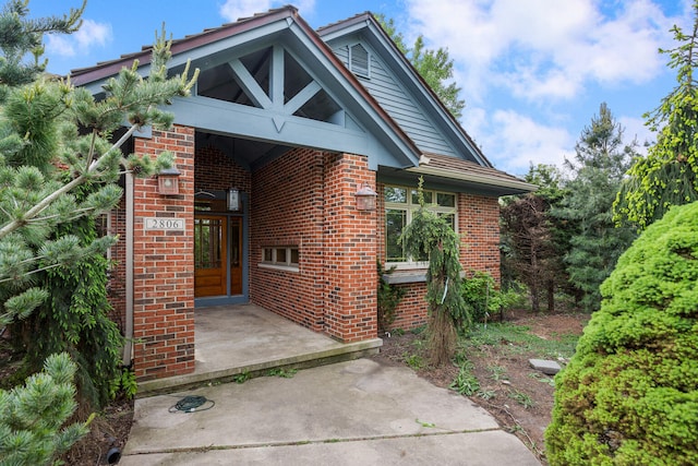 2806 Oakmont Ct, Champaign, IL 61821 - doorway to property with brick siding