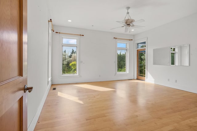 2806 Oakmont Ct, Champaign, IL 61821 - unfurnished room with light wood-type flooring, baseboards, a ceiling fan, and recessed lighting