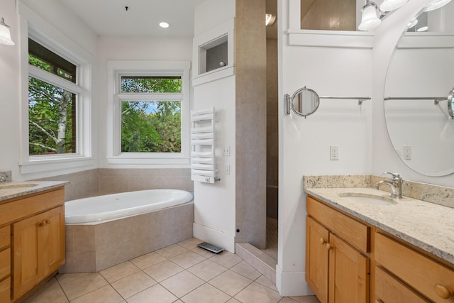 2806 Oakmont Ct, Champaign, IL 61821 - full bath featuring radiator, vanity, tile patterned floors, a bath, and recessed lighting