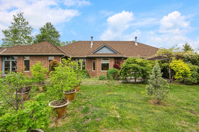 2806 Oakmont Ct, Champaign, IL 61821 - view of front of house with brick siding and a front lawn