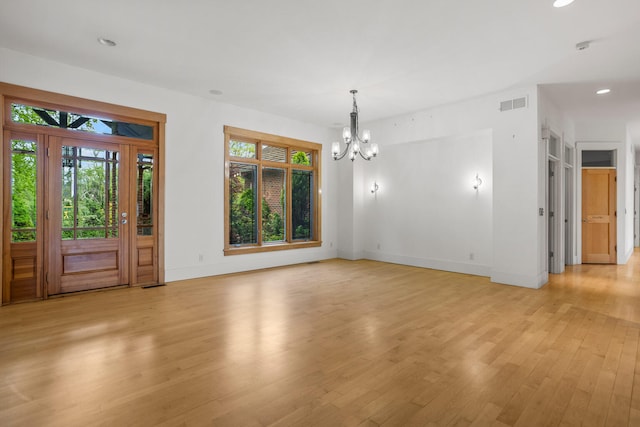 2806 Oakmont Ct, Champaign, IL 61821 - foyer with plenty of natural light, a chandelier, light wood-style floors, baseboards, and recessed lighting