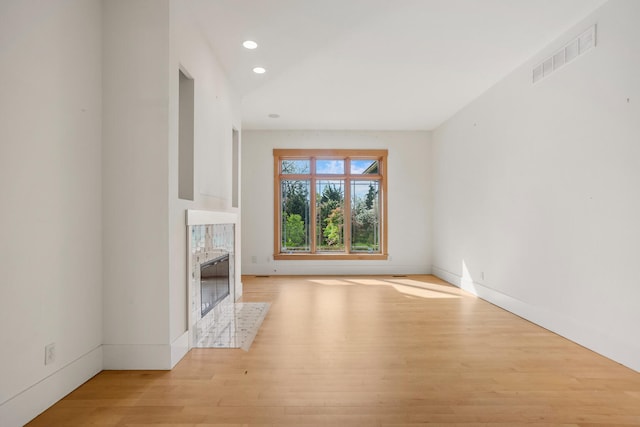 2806 Oakmont Ct, Champaign, IL 61821 - unfurnished living room featuring wood finished floors, recessed lighting, a fireplace, and baseboards