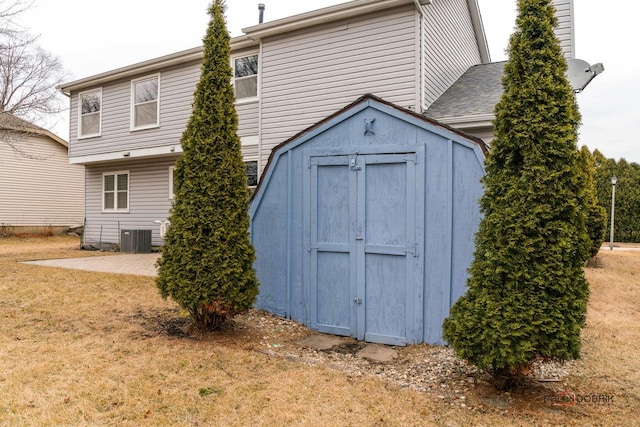 view of shed with central AC unit