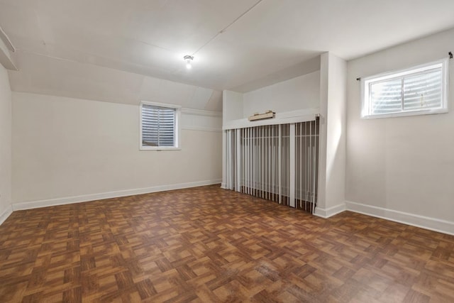 empty room featuring baseboards