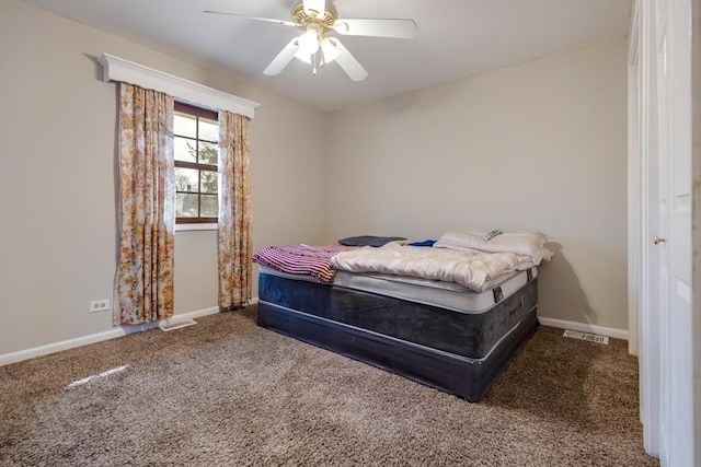 bedroom featuring carpet floors, visible vents, ceiling fan, and baseboards