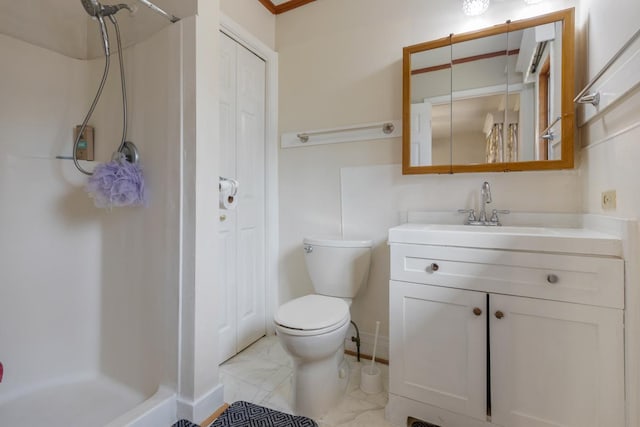 bathroom featuring marble finish floor, a closet, toilet, a shower stall, and vanity