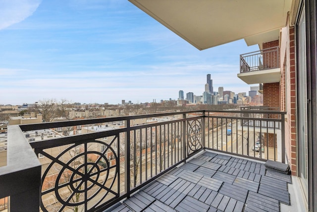 balcony featuring a city view