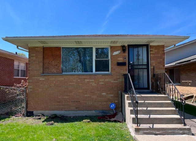 view of front of house with brick siding