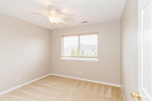 87 E Haines Dr Unit 87, Hainesville, IL 60030 - spare room featuring baseboards, a ceiling fan, visible vents, and light carpet