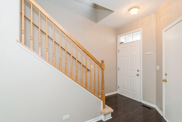 87 E Haines Dr Unit 87, Hainesville, IL 60030 - entrance foyer featuring stairs, baseboards, visible vents, and wood finished floors