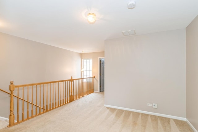 87 E Haines Dr Unit 87, Hainesville, IL 60030 - carpeted spare room featuring baseboards and visible vents