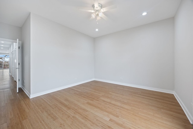 unfurnished room featuring light wood finished floors, recessed lighting, baseboards, and a ceiling fan