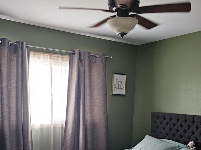 bedroom featuring ceiling fan