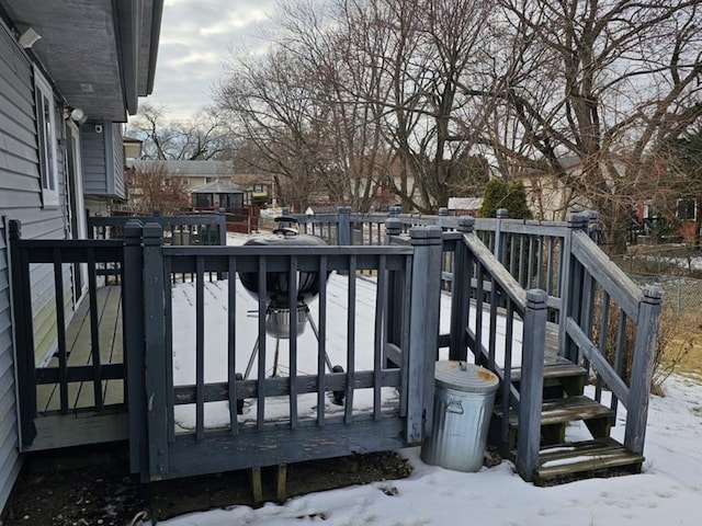 view of snow covered deck