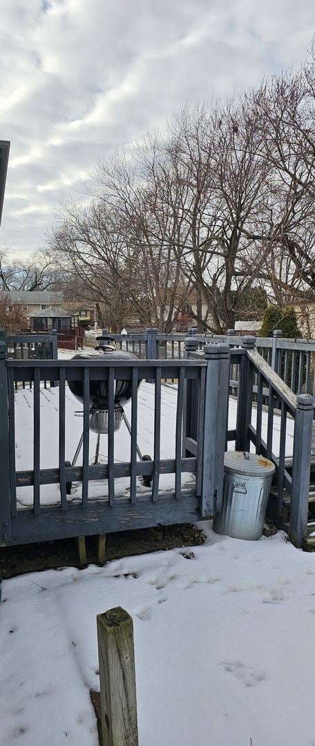 view of snow covered deck