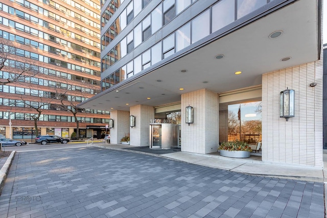 exterior space featuring brick siding