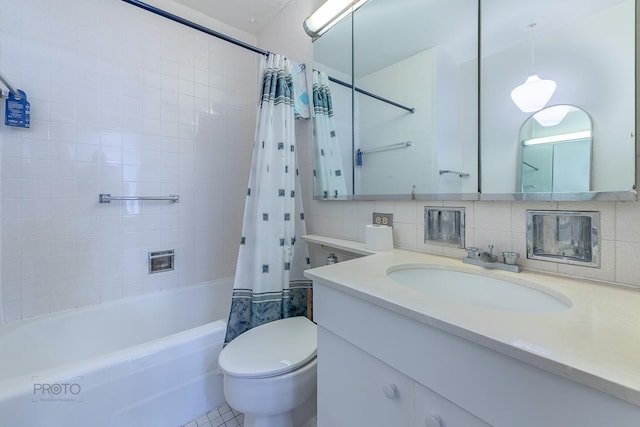 bathroom with shower / tub combo with curtain, tile walls, toilet, decorative backsplash, and vanity