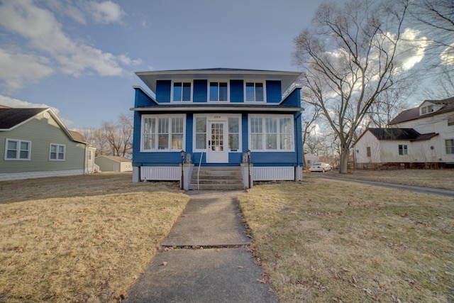 view of front of house featuring a front yard