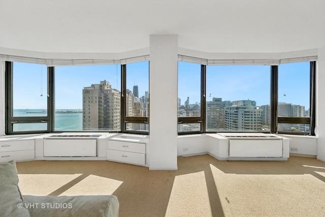 unfurnished sunroom featuring a city view