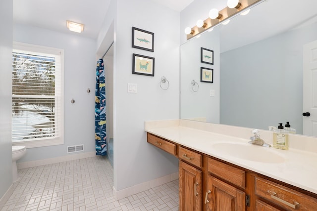 bathroom with tile patterned floors, visible vents, toilet, a shower with curtain, and vanity