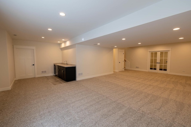 591 S Saylor Ave, Elmhurst, IL 60126 - finished basement with light carpet, recessed lighting, wet bar, baseboards, and visible vents