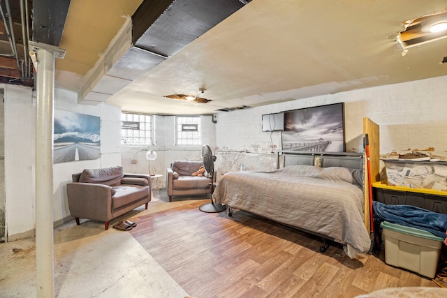 bedroom with wood finished floors