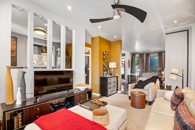 carpeted living room featuring a ceiling fan and recessed lighting