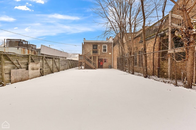 view of yard covered in snow