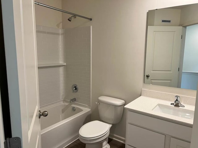 bathroom featuring visible vents, baseboards, toilet,  shower combination, and vanity