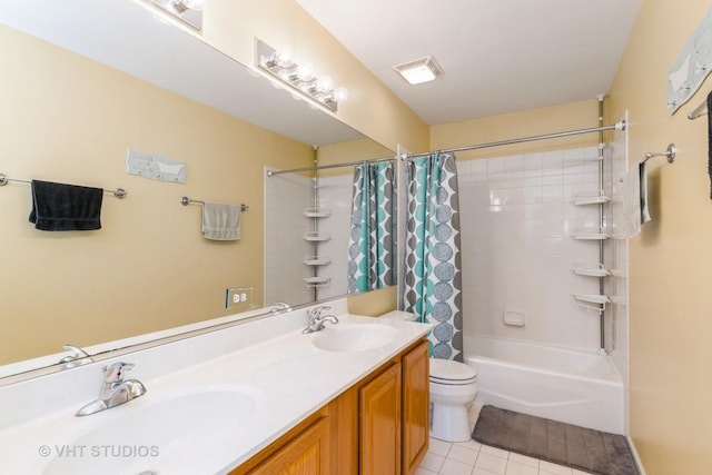 full bathroom featuring shower / bathtub combination with curtain, visible vents, a sink, and tile patterned floors