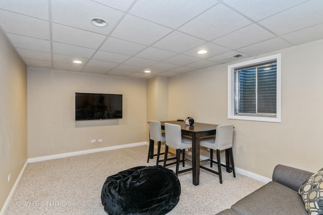 carpeted dining room featuring recessed lighting, a paneled ceiling, and baseboards