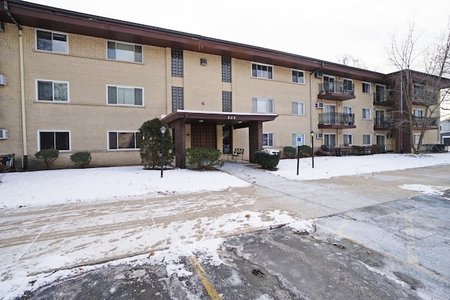 view of snow covered building