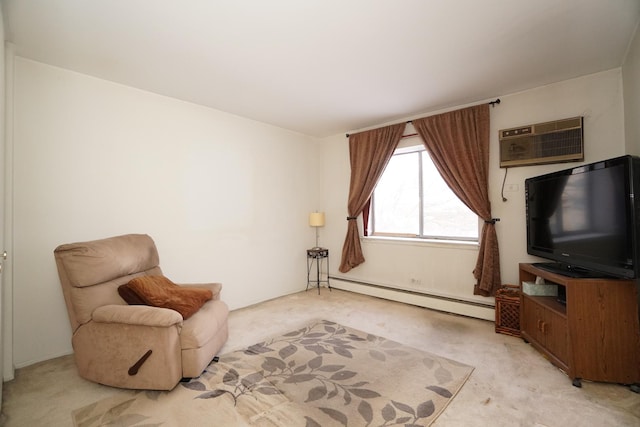 sitting room with baseboard heating, a wall unit AC, and light colored carpet