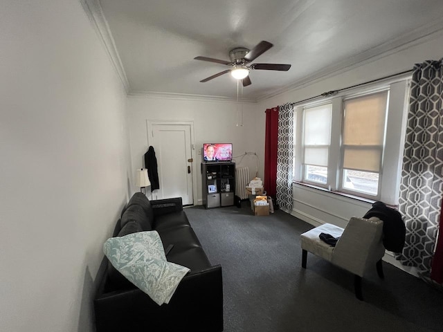 carpeted living room with ceiling fan and ornamental molding