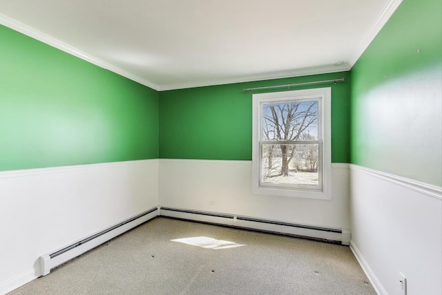 carpeted empty room featuring ornamental molding