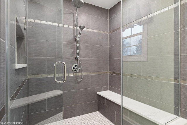 full bathroom with a shower stall