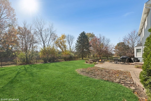 view of yard with a patio area and fence