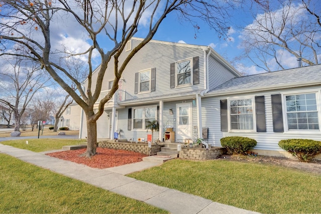 view of front of property with a front lawn