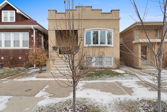 view of front of property with brick siding